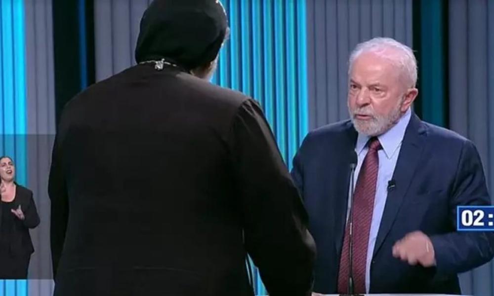 Padre Kelmon durante debae da rede Globo 