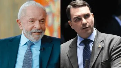 O senador Flávio Bolsonaro (PL-RJ) se aproxima do presidente Lula (PT)